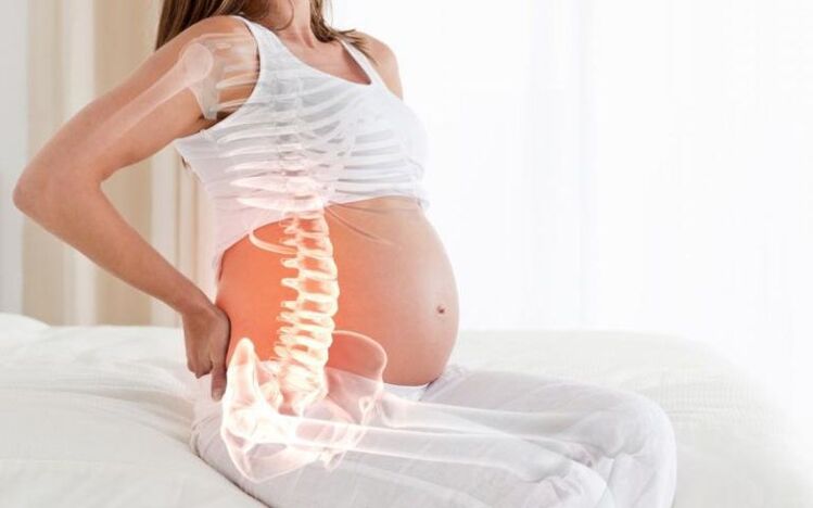 As mulleres embarazadas experimentan dor na columna vertebral entre os omóplatos debido ao aumento da carga dos músculos das costas